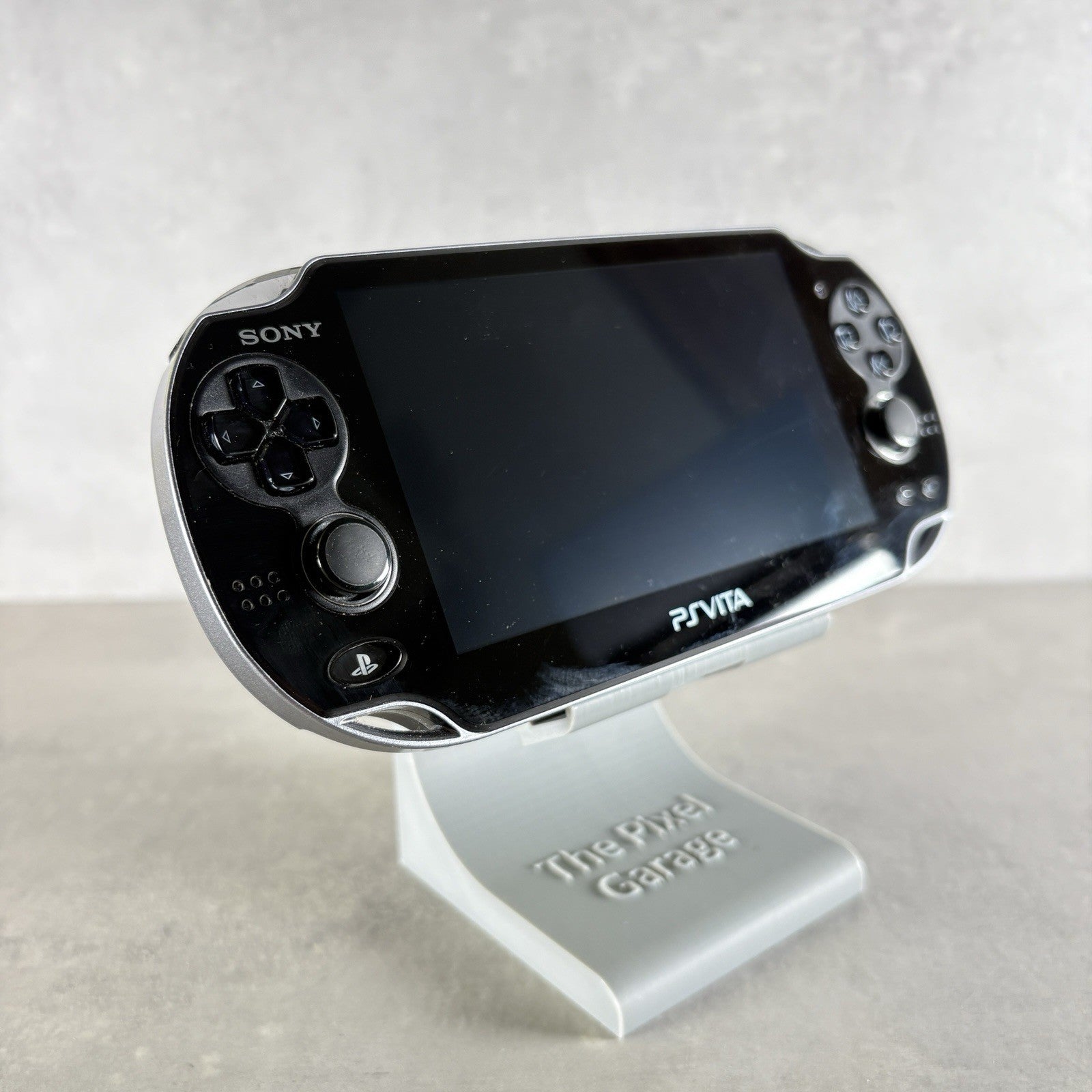 Sony PS VITA OLED PCH-1004 CONSOLE + Caricatore Mod Con Giochi