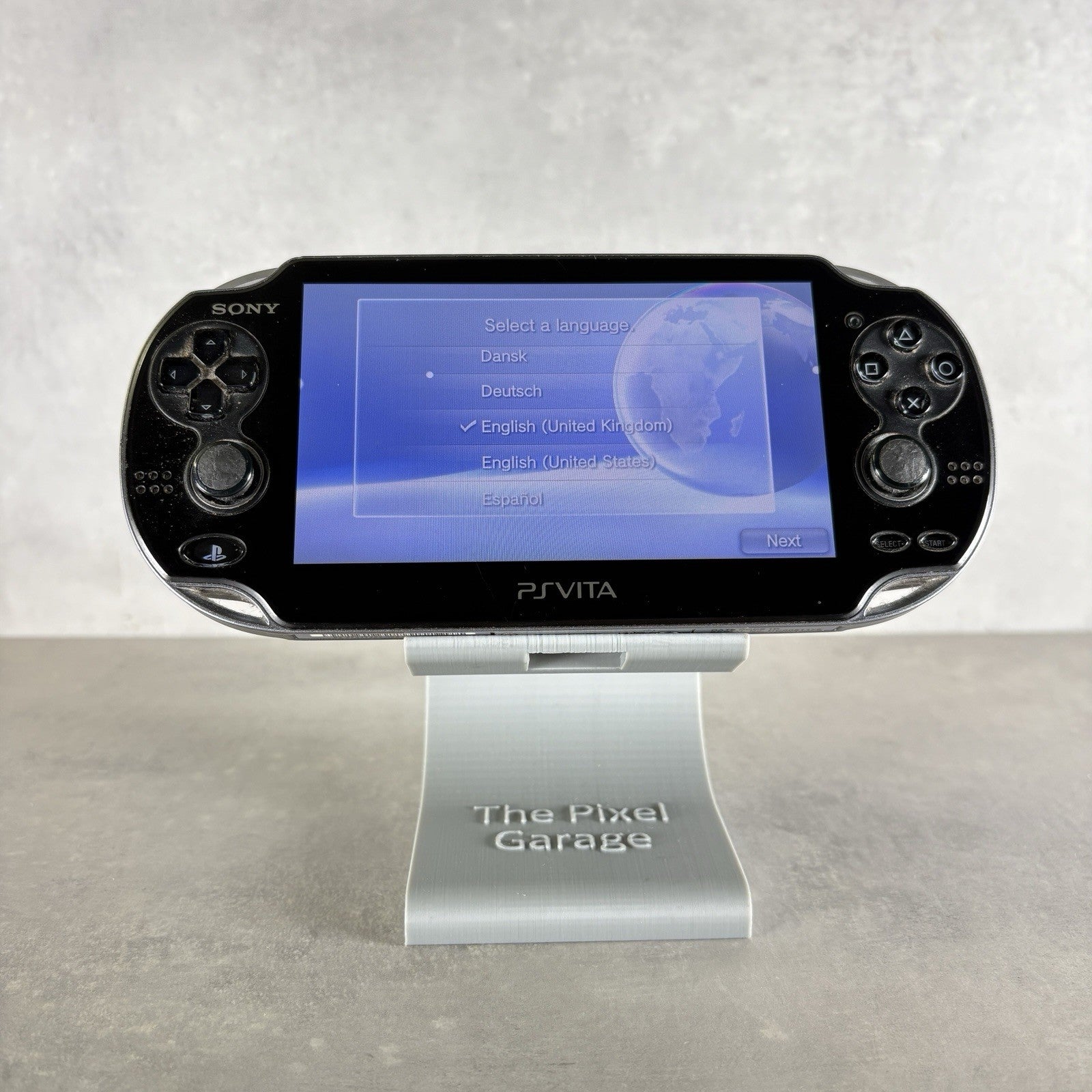 Sony PS VITA OLED PCH-1004 Nero  Console + Caricatore