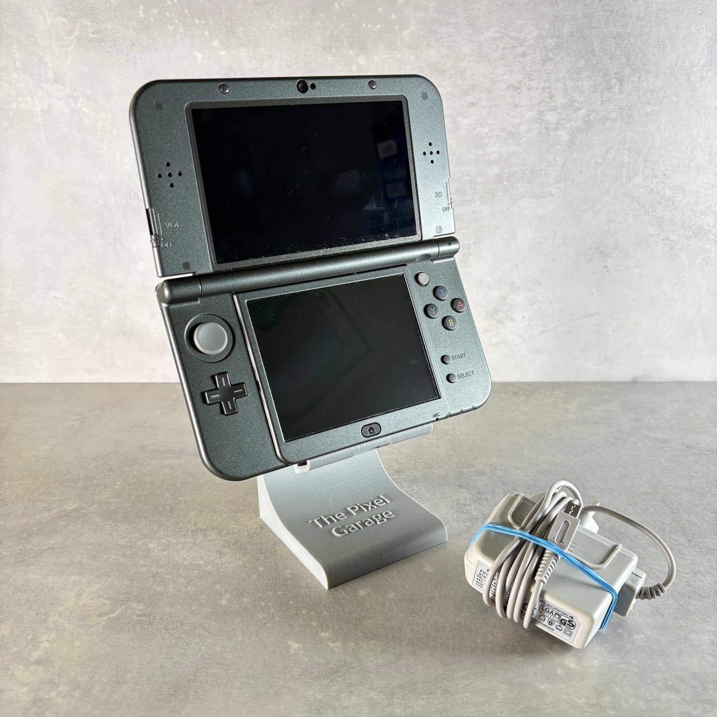 New Nintendo 3DS XL – Grigio Metallico/Nero (Usato) + Caricatore Compatibile