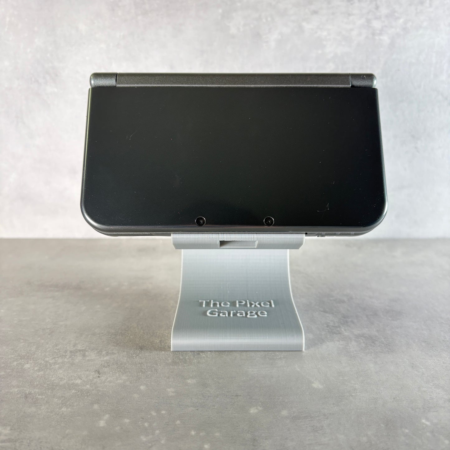 New Nintendo 3DS XL – Grigio Metallico/Nero (Usato) + Caricatore Compatibile