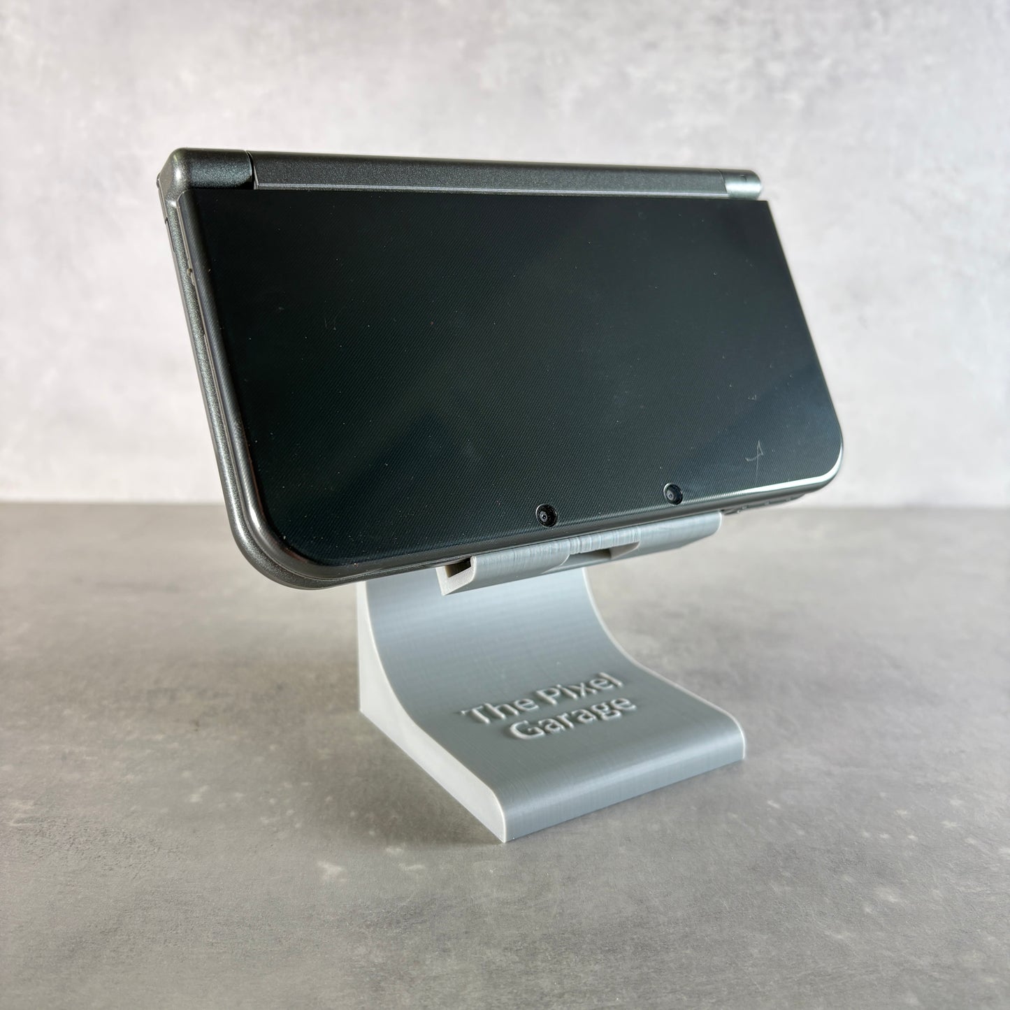 New Nintendo 3DS XL – Grigio Metallico/Nero (Usato) + Caricatore Compatibile