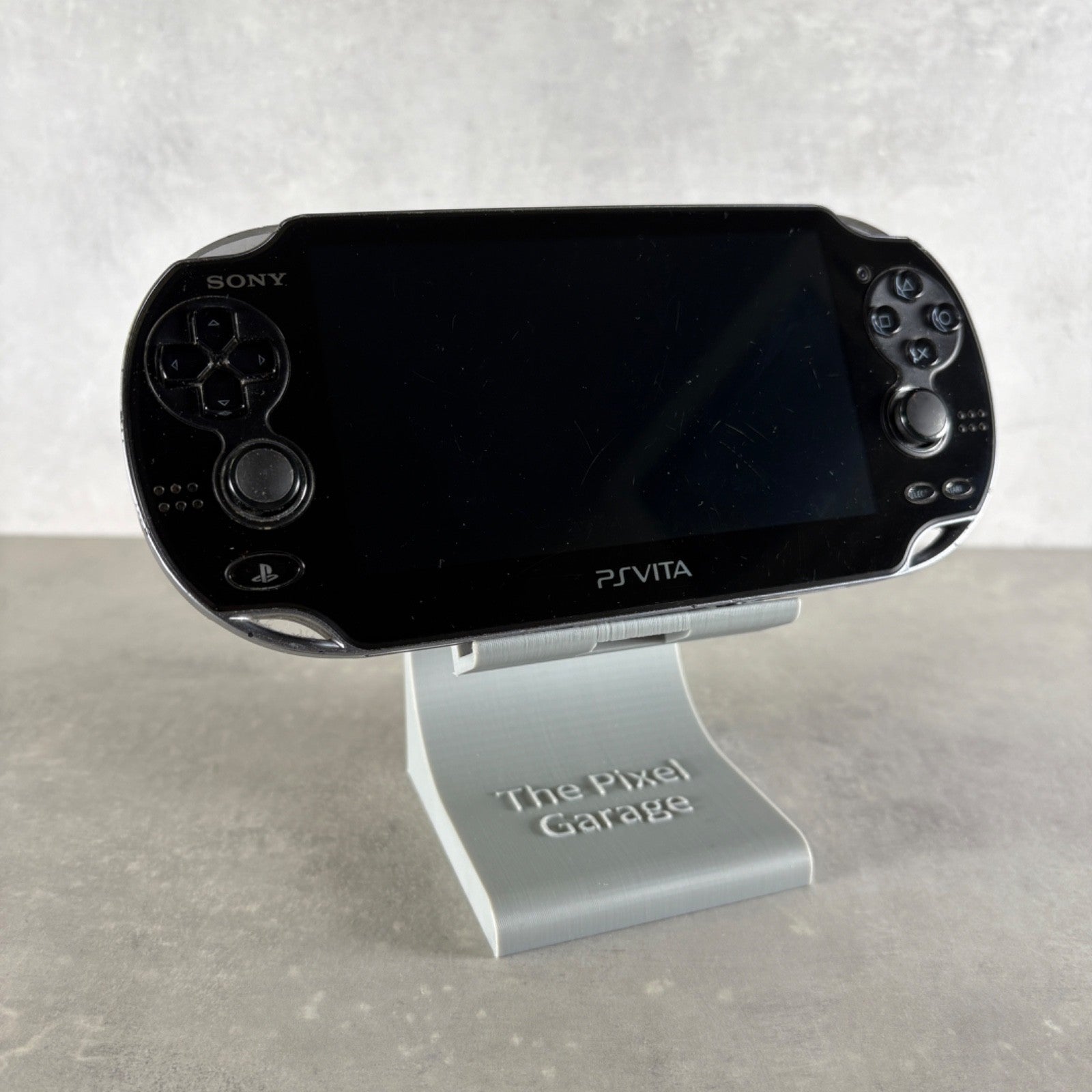 Sony PS VITA OLED PCH-1004 Nero  Console + Caricatore