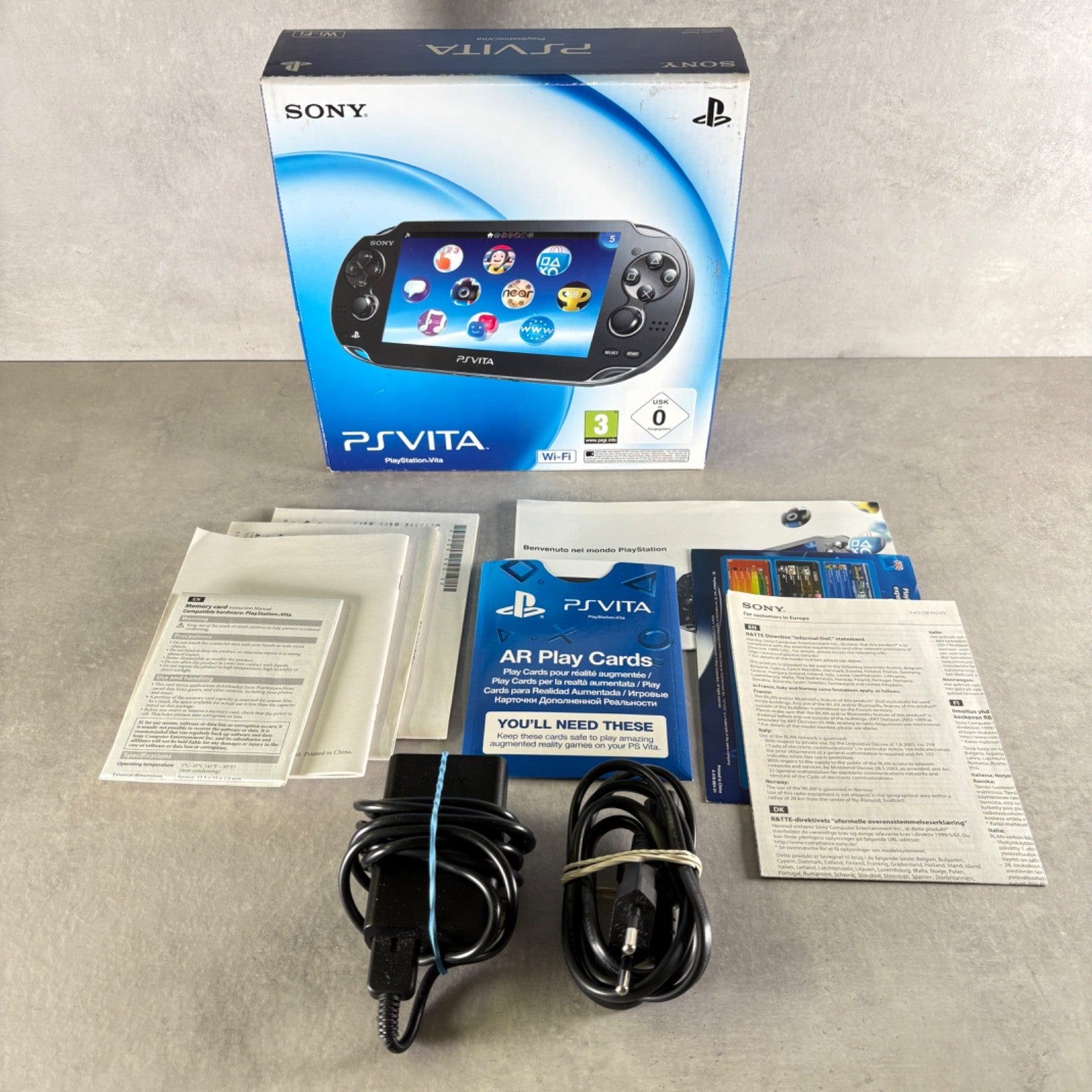 Sony PS VITA OLED PCH-1004 Nero CONSOLE Completa Di Tutto + Caricatore